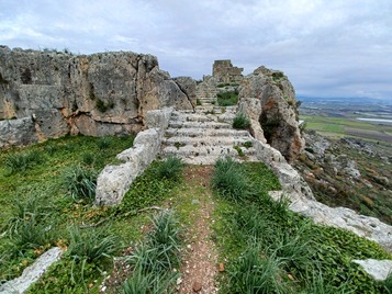 Rock cut stairs to temple area.