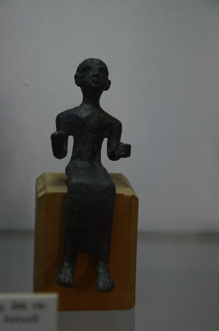 Enkomi, Bronze statuette of a stting figure