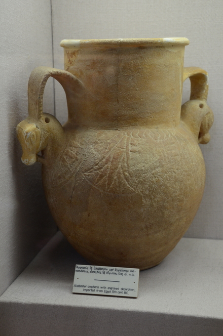 Alabaster amphora with engraved decoration and horsehead as handle, imported from Egypt