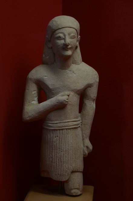 Egyptianizing limestone statue of a man