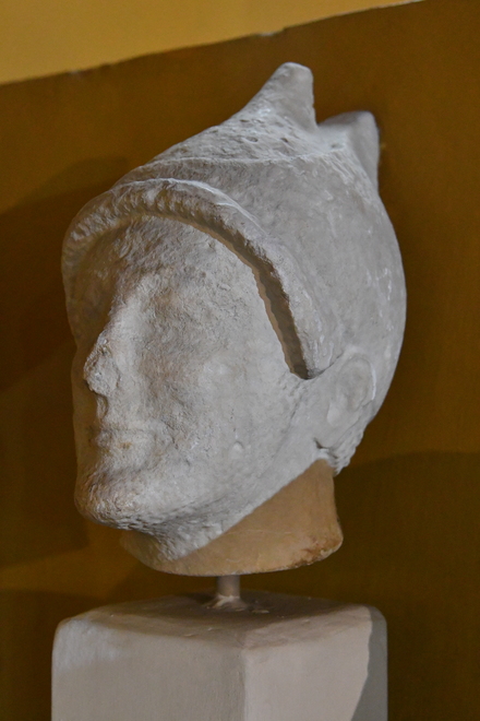 Portrait of a votary with a double cap