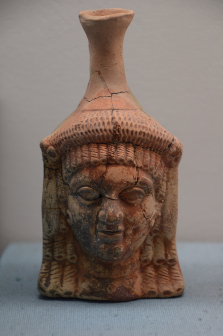 Hellenistic jar with the face of a woman