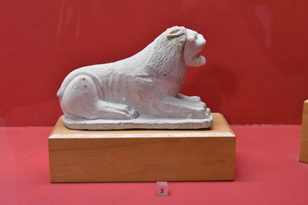 Limestone statue of a lion