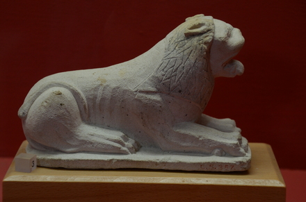 Limestone statue of a lion