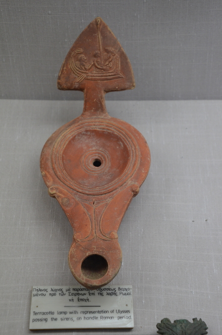 Terracotta lamp with representation of Ulysses, passing the Syrens on handle