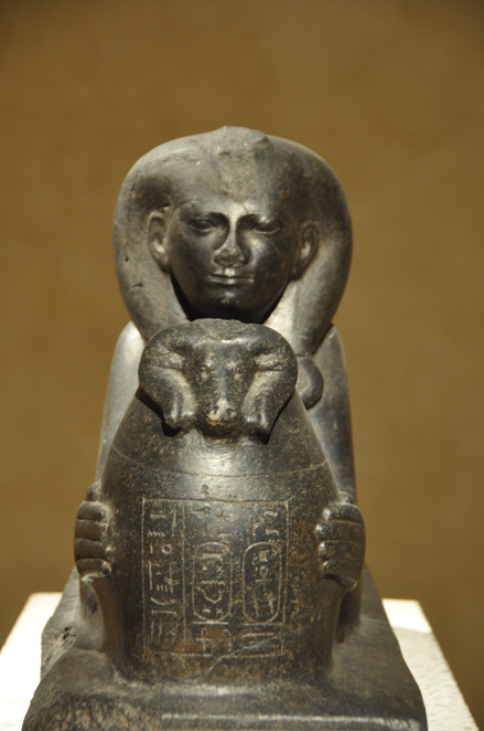 Karnak, Sphinx holding a ram, with cartouche of princess Shepenupet