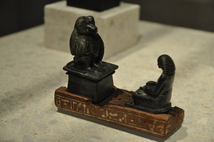 Statuette of a scribe venerating Thoth