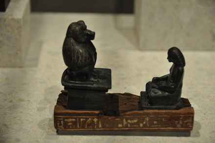 Statuette of a scribe venerating Thoth