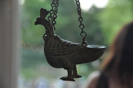 Oil lamp in the shape of peacock