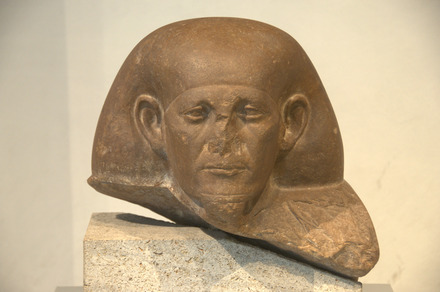 Block statue, portrait of a man