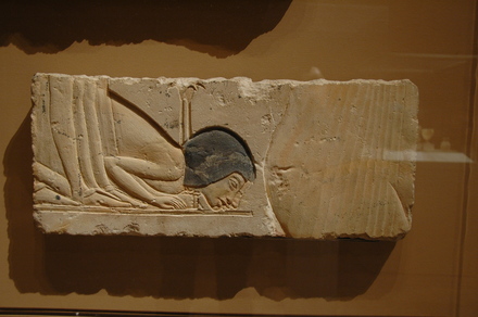 Relief of someone prostrating himself before Akhenaten