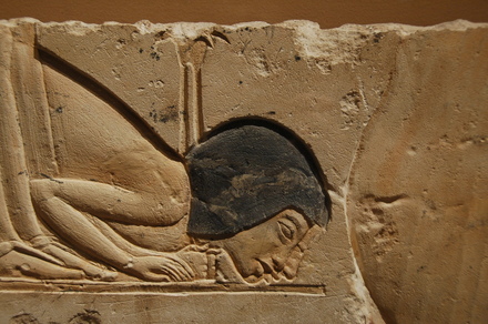 Relief of someone prostrating himself before Akhenaten