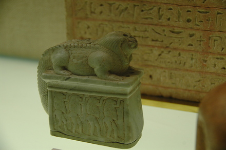 Figurine of a crocodile god on a pedestal of baboons