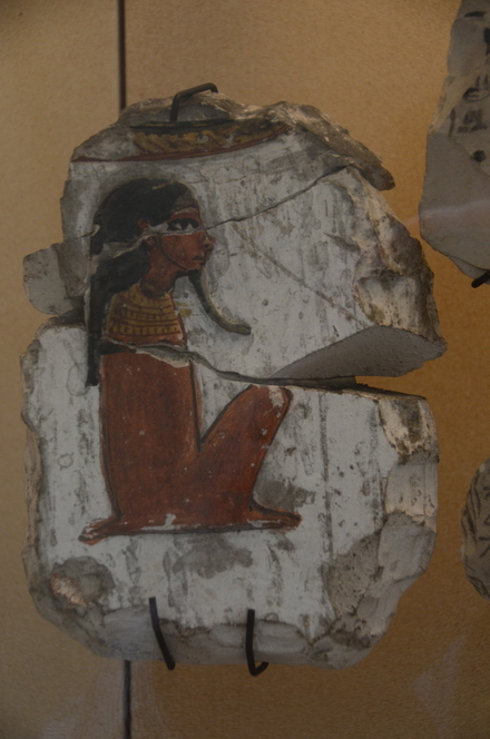 Hieroglyph of a seated god