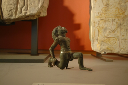 Figurine of tied Libyan POW