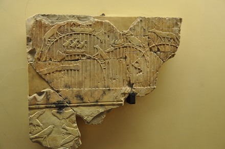 Relief of a cat and birds