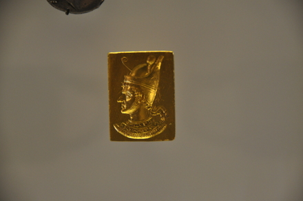 Gold plate with relief of Ptolemy XI Alexander