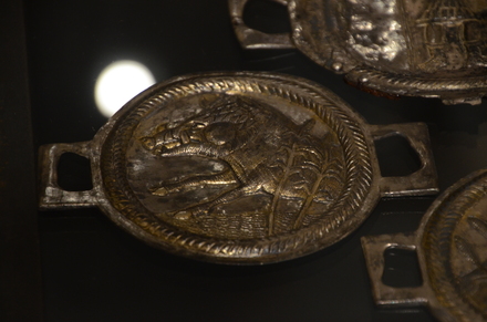 Ittenheim, Phalerae of gilded silver, with a  legionnaire personificating Courage and wild boar in a moor