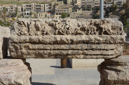 Amman, Forum, colonnade with frieze with flowers and Greek inscription