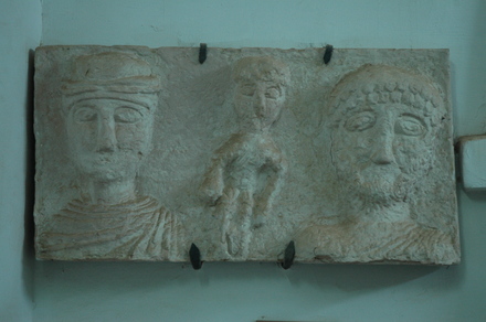 Relief with three people