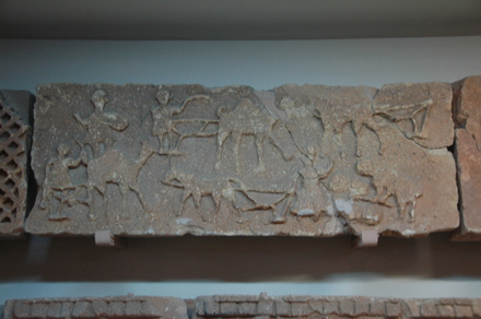 Ghirza, South cemetery, Mausoleum C, relief of farmers