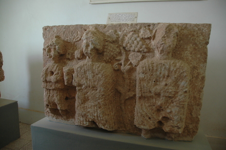 Ghanafes, relief of a couple with a vine