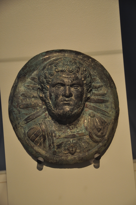 Bronze shield with head of emperor Caracalla