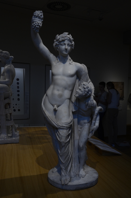 Triumphant Bacchus leaning on a satyrrmo