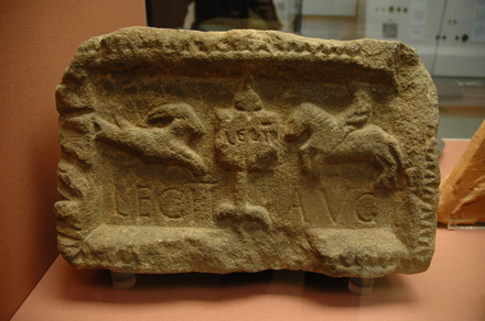 Relief with tree, capricorn and man on horse from Legio II August