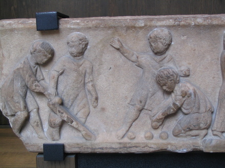 Relief with playing children