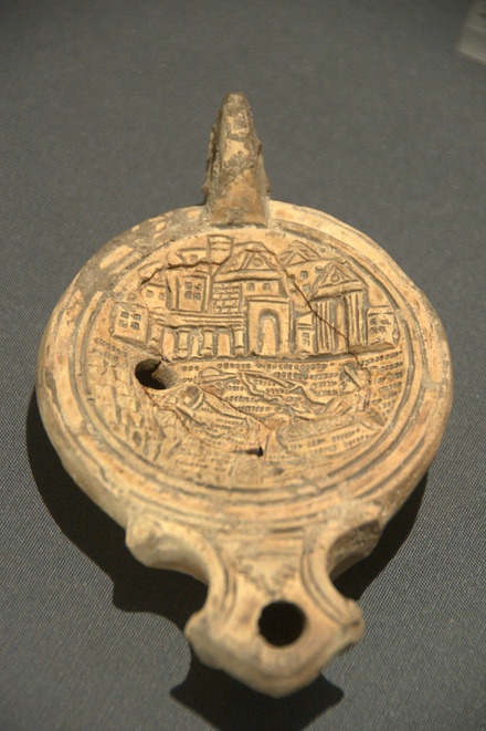 Oil lamp with city and fish