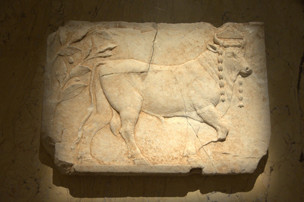 Relief with a sacrificial bull
