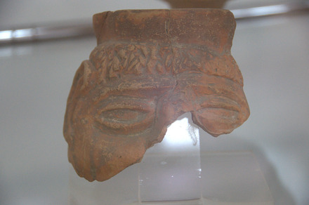 Pot with a face