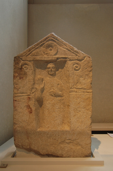 Carthage, Tombstone with votive relief of a male, raising a hand