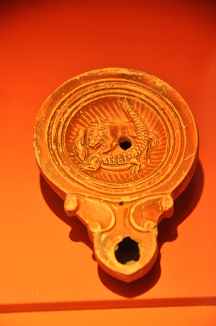Utica, Roman oil lamp with a lion and a crocodile
