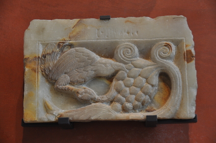 Relief of a bird with grapes