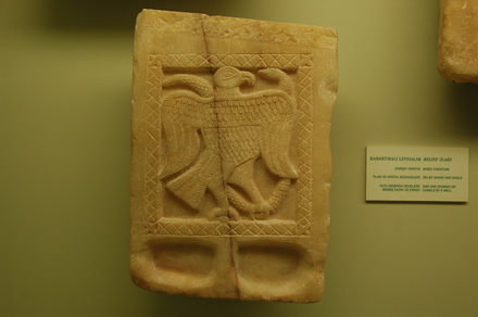 Relief of a bird with a snake