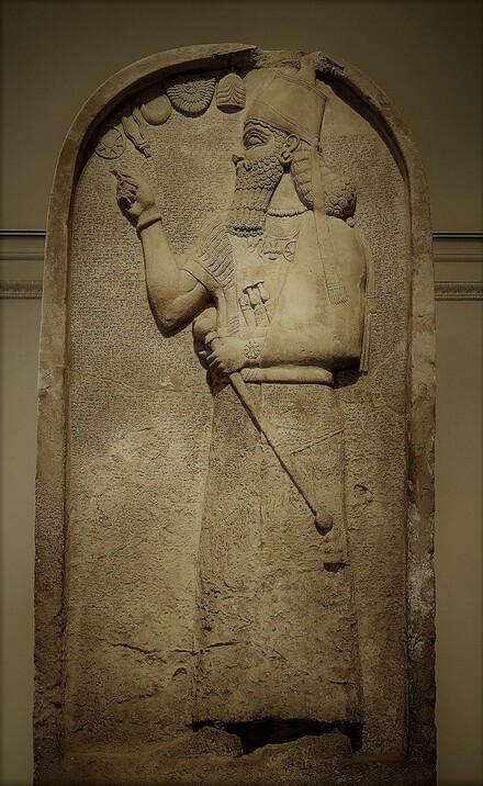 Limestone stela of Ashurnasirpal II , 879 BC