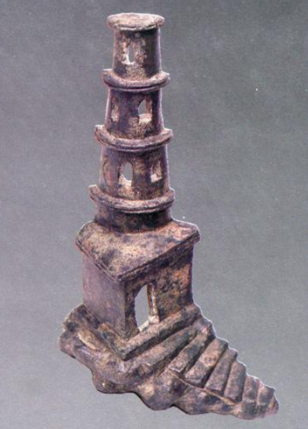 Bronze lamp shaped like a lighthouse, perhaps a miniature replica of Caligula lighthouse, found in Libarna.