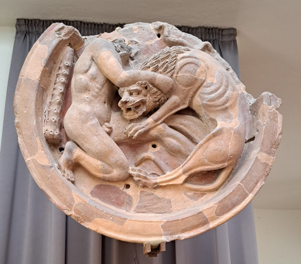 Acroterion of Hercules fighting the Nemean Lion
