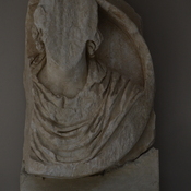 Dyrrachium, Clipeus with a damages head of a man