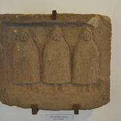 Relief of genii cucullati (native gods)