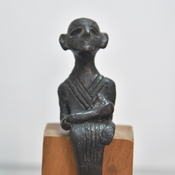 Enkomi, Late bronze statuette of a stting figure