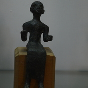 Enkomi, Bronze statuette of a stting figure