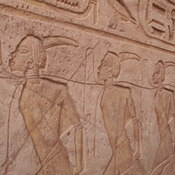 Abu Simbel, Temple by Ramesses II, Men, Low relief of kneeling Nubian prisoners of war