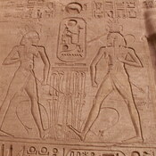 Abu Simbel, Temple by Ramesses II, Men, Low relief showing unification with cartouche of Ramesses II