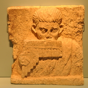 Oxyrhynchus, Relief of a flute player