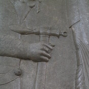 Persepolis, Apadana, Northstairs, Central relief, Battle axe