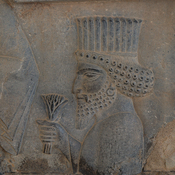 Persepolis, Apadana, East Stairs, Relief of a man with a lotus