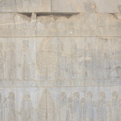 Persepolis, Apadana, East Stairs, Relief of Bactrians, Gandarans, Arachosians, trees, (damaged) Egyptians, Sacae, and Greeks